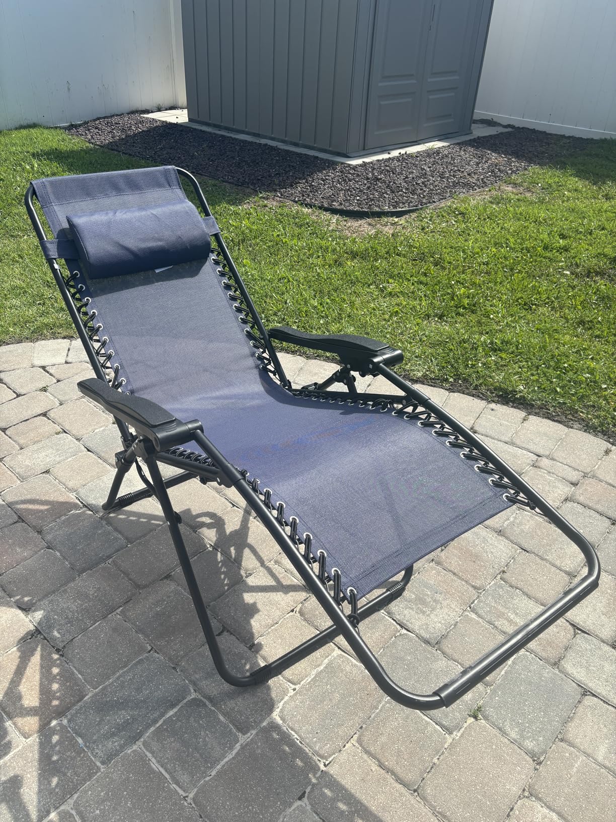 Amazon Basics Zero Gravity Lounge Chair with Pillow, Foldable Outdoor Reclining Chair for Patio and Beach, Weather-Resistant Textilene, 300 lb Capacity, 26 inch, Navy Blue customer photo 1