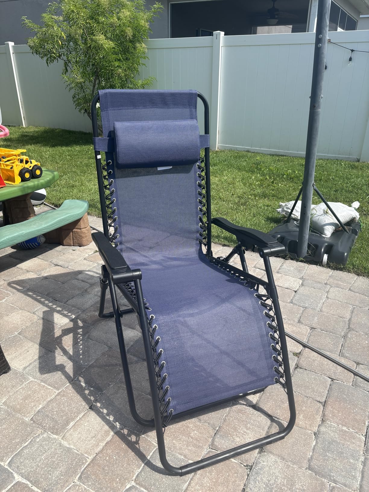 Amazon Basics Zero Gravity Lounge Chair with Pillow, Foldable Outdoor Reclining Chair for Patio and Beach, Weather-Resistant Textilene, 300 lb Capacity, 26 inch, Navy Blue customer photo 2