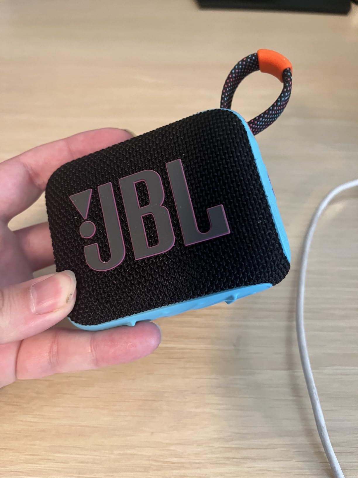JBL Go 4 - Ultra-Portable, Waterproof and Dustproof Bluetooth Speaker, Big JBL Pro Sound with Punchy bass, 7-Hour Built-in Battery, Made in Part with Recycled Materials (Black) customer photo 2