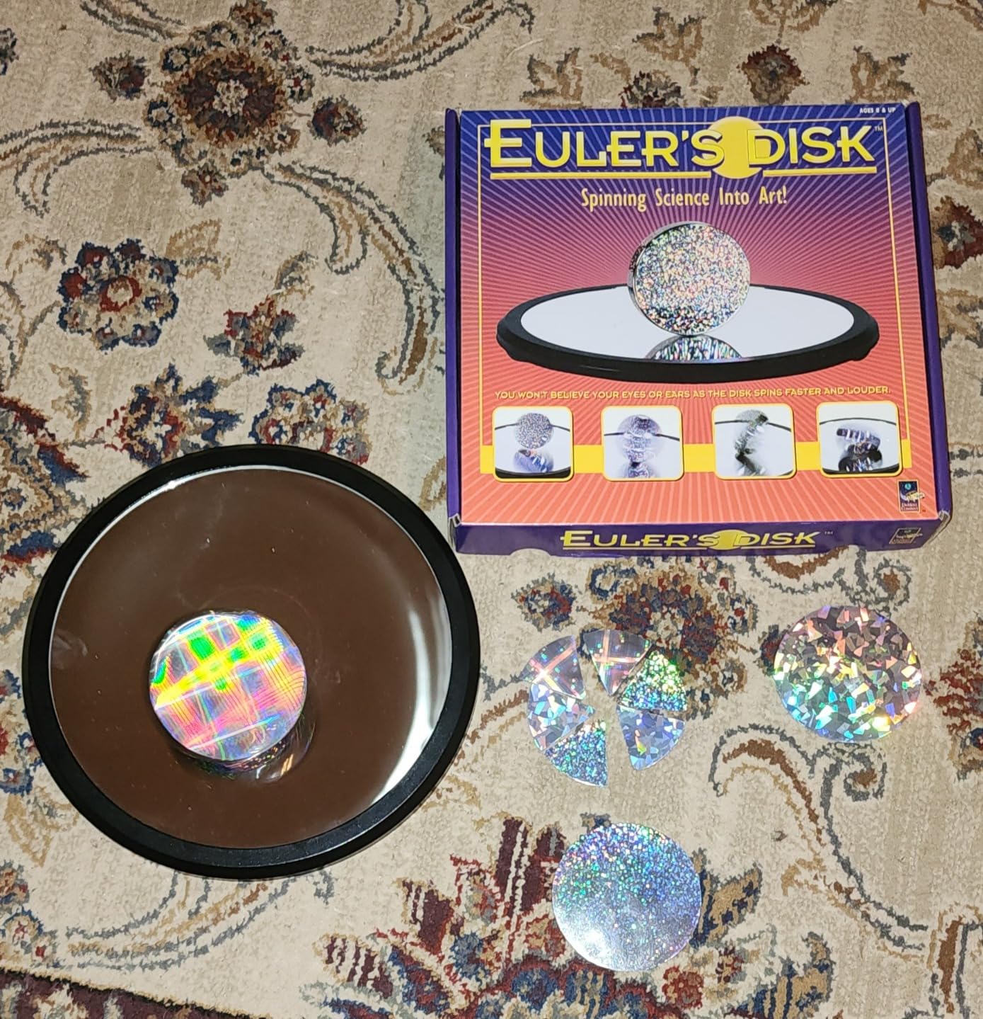 Toysmith Euler's Disk Physics Science Desk Toy, Chrome, 3 inches | Spinning Disk, Mirror Base, Light Refraction, Sound Display, Physics Demo, Desk Toy, Classroom Activity, STEM Toy, Ages 8+ customer photo 2