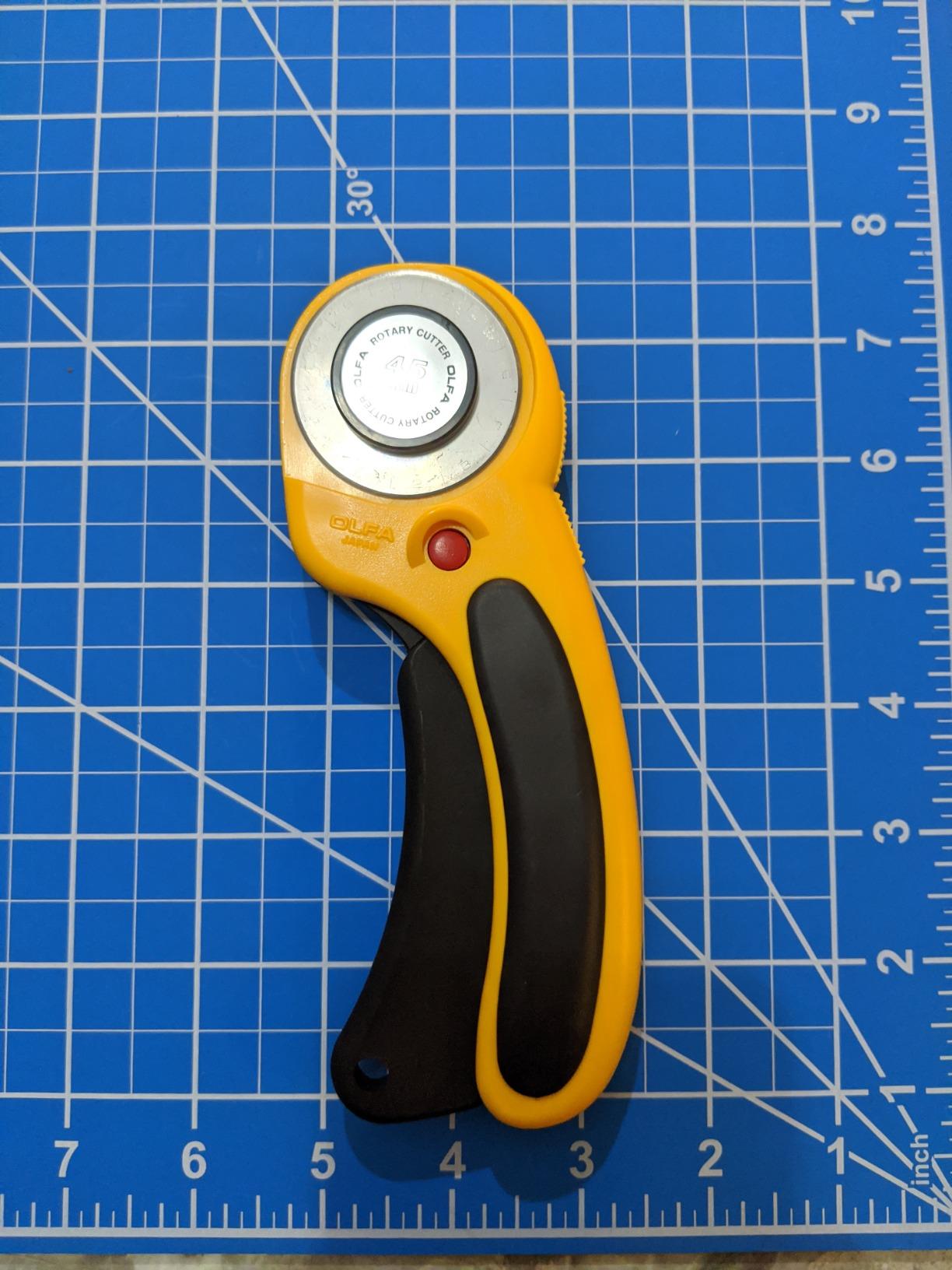 OLFA 45mm Ergonomic Squeeze-Handle Rotary Cutter (RTY-2/DX) - Auto-Retract | 45mm endurance tungsten steel, squeeze trigger auto-retract - High-volume quilting - Quilters and Crafters customer photo 1