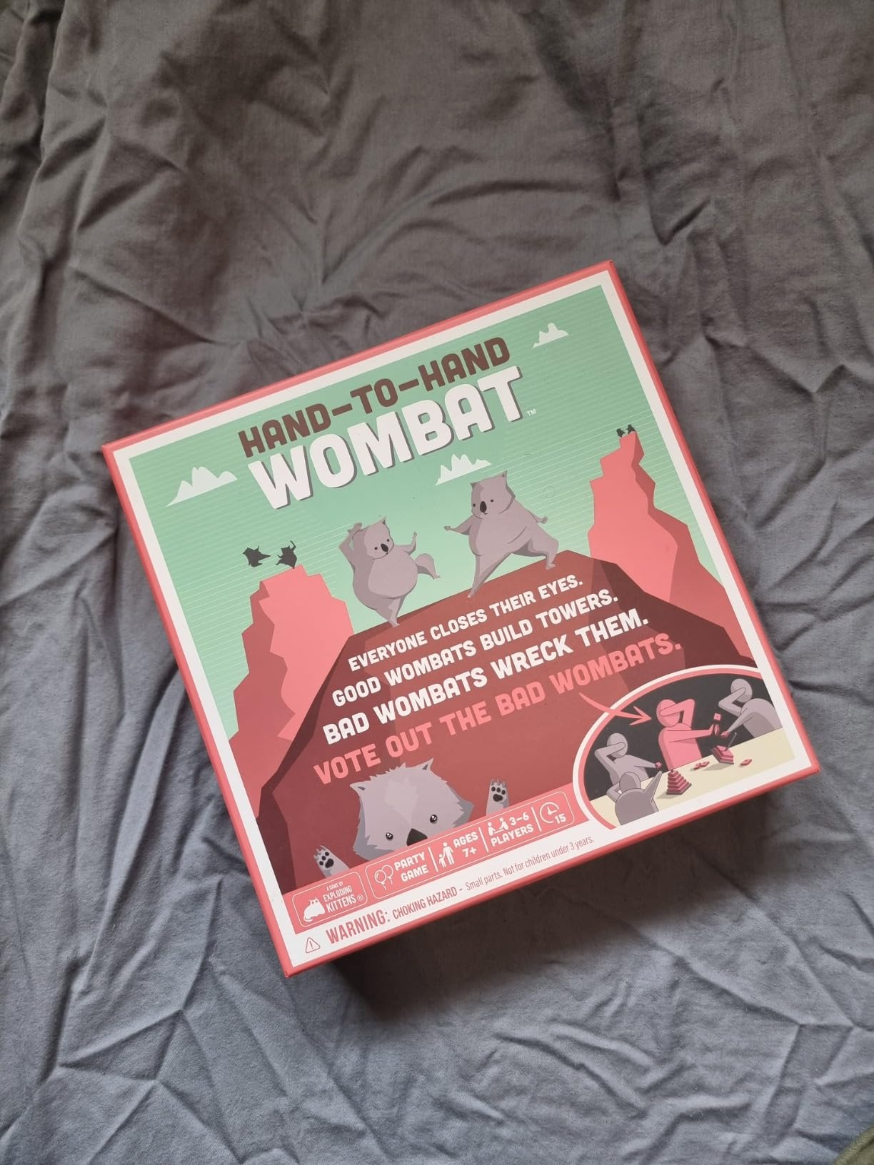 Exploding Kittens Hand to Hand Wombat, 3-6 Players, Age 7+ | Build towers with your eyes closed, spot the secret saboteurs, and vote out the Wicked Wombats before they wreck it all! customer photo 2