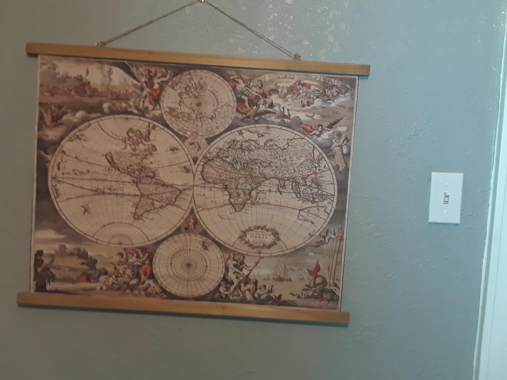 XIAOAIKA Vintage World Map Wall Decor - 17th Century Linen Print with Wooden Hanger, Double Hemisphere Design, Nautical and Mythological Illustrations, Retro Maritime Exploration Art, 39 x 29 Inches customer photo 1
