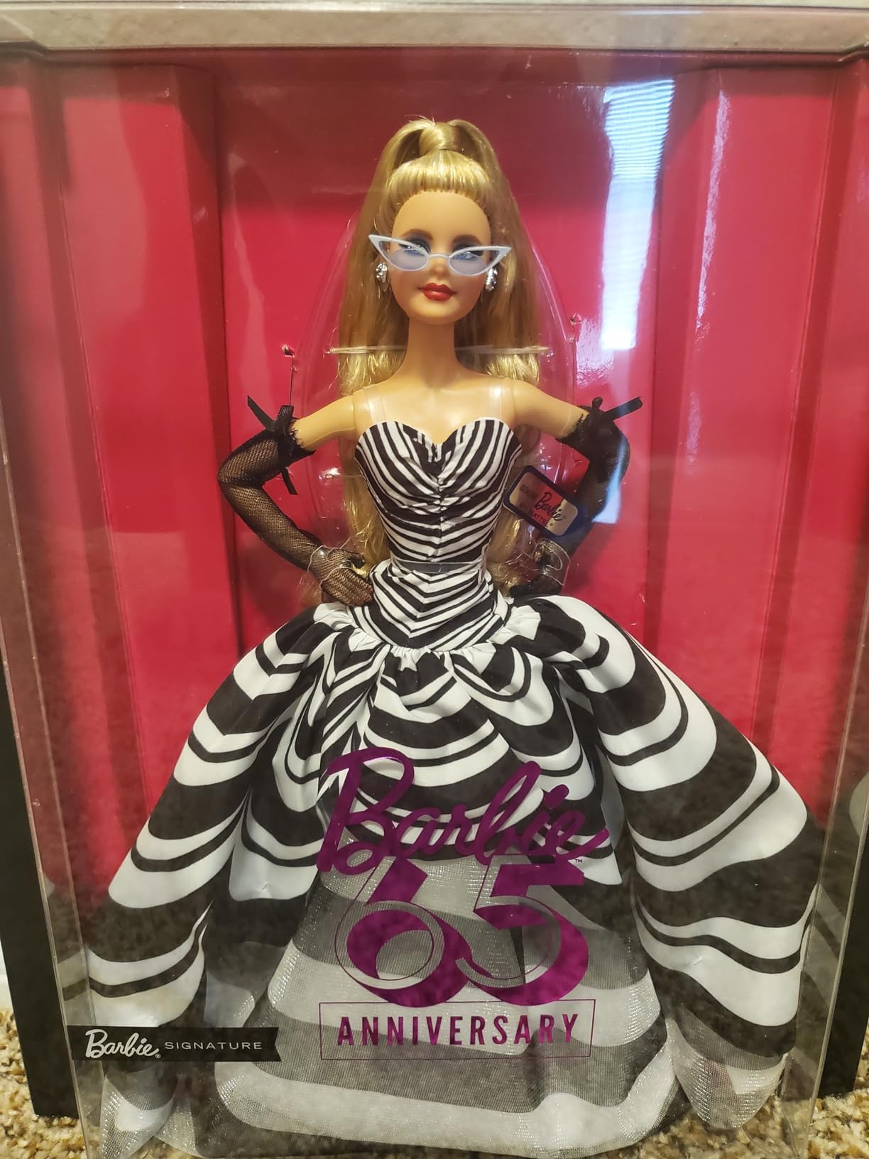 Barbie Signature Doll, 65th Anniversary Collectible with Blonde Hair, Black & White Gown, Sapphire Gem Earrings & Sunglasses customer photo 1