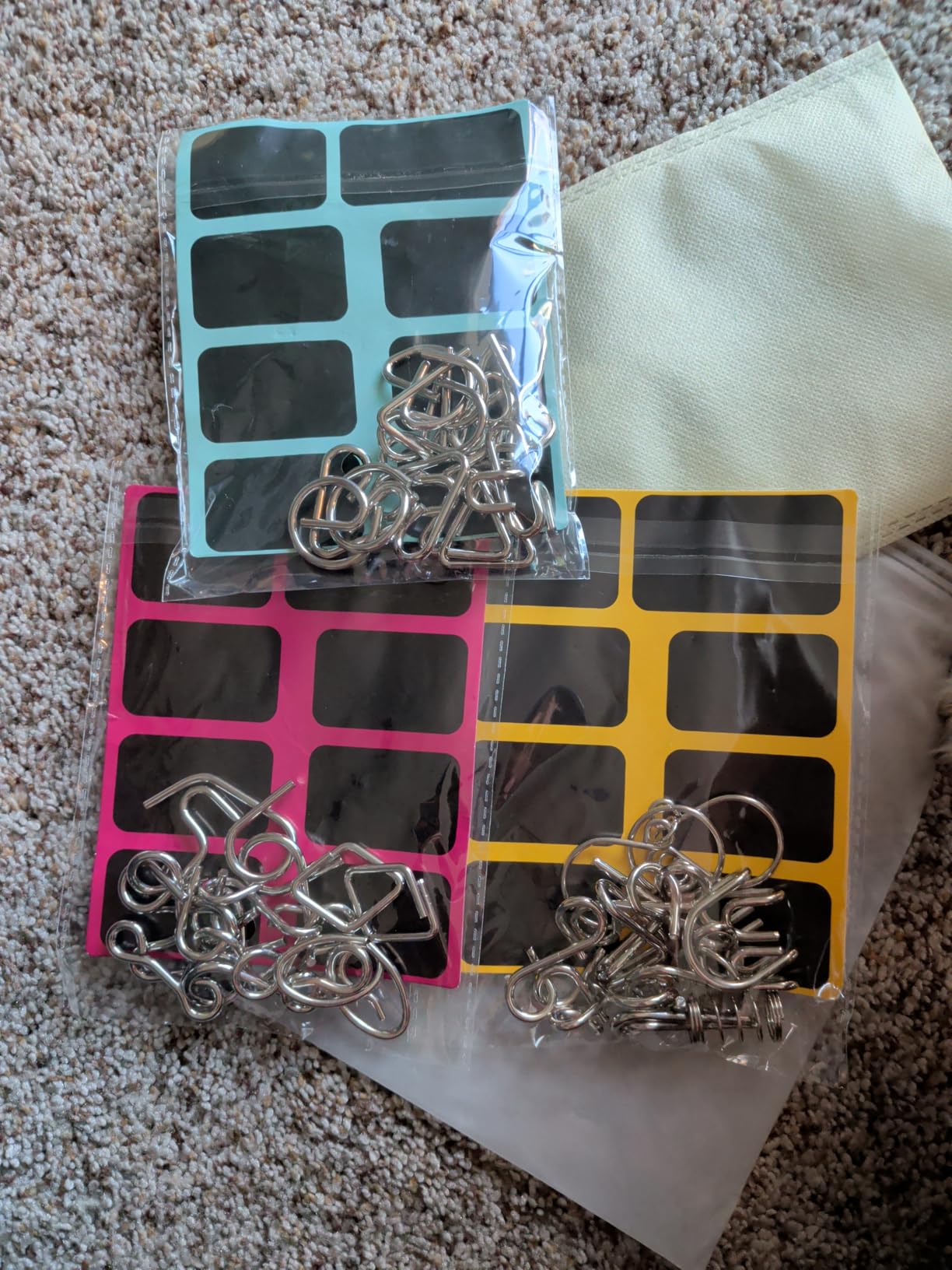 Metal Wire Puzzle Set of 24 with Pouch | Brain Teaser IQ Test Disentanglement Iron Link Unlock Interlock Game Party Favor Kids Adults Challenge customer photo 1