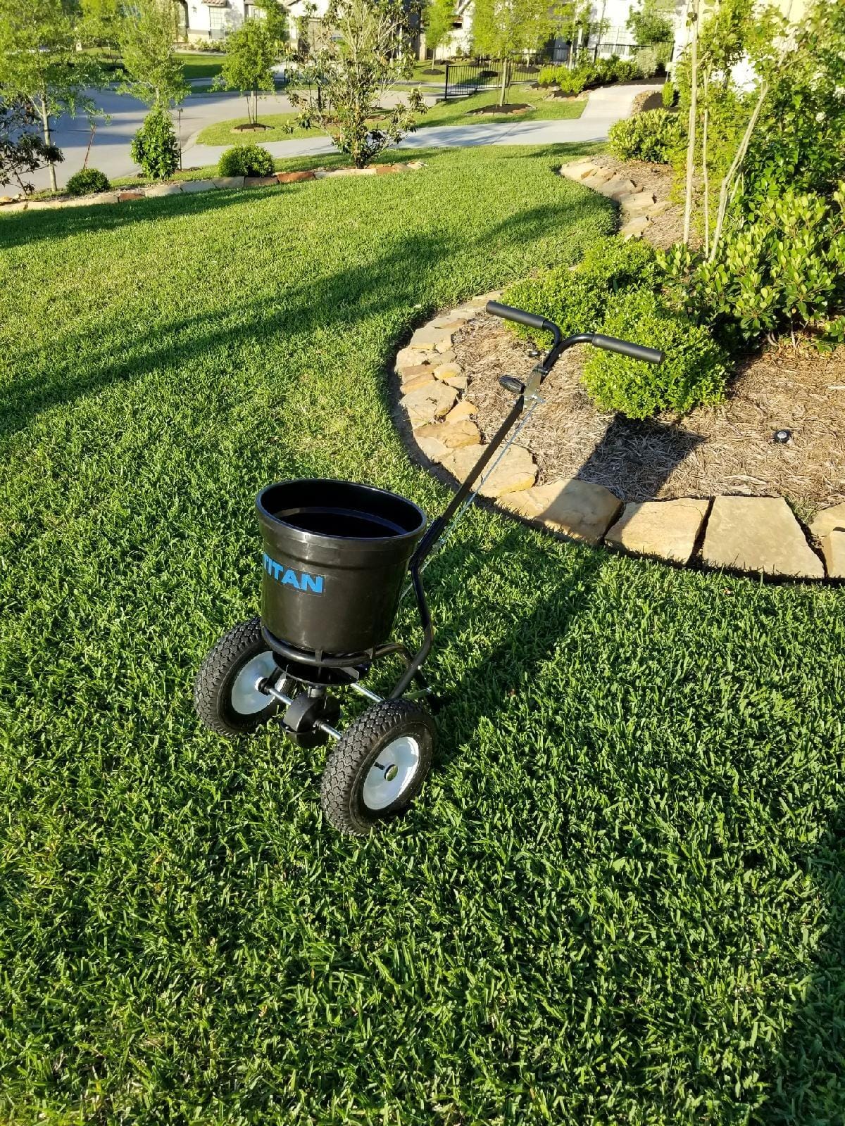Titan Attachments 50 lb Professional Fertilizer Push Broadcast Spreader, Spreads 10 to 12 FT, Lawn Care and Ice Melter, Yard Tool customer photo 1