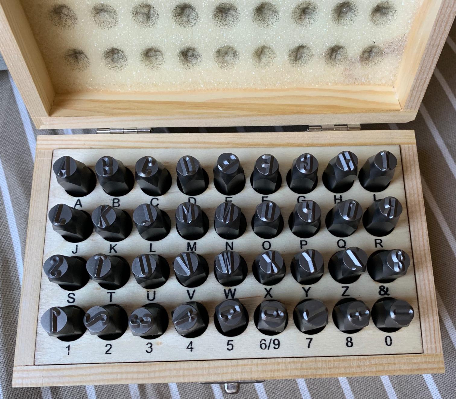 Amazon Basics Metal Stamping Kit, Alphabet and Number Stamps, 36-Piece Set with Wood Storage Case, 4/25 inch, for Leather, Wood, Clay, Crafting customer photo 1