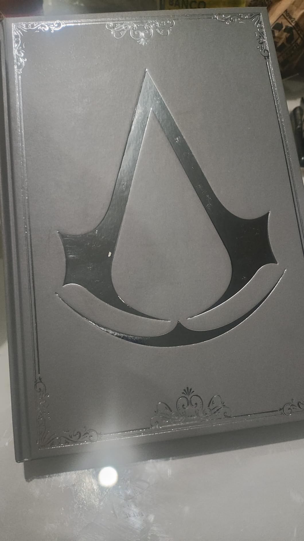 Assassin's Creed Notebook- Lined Hardcover- 200 Pages | 200-Page Lined Hardback, Silver Foil Logo, Great for Gamers and Collectors customer photo 1