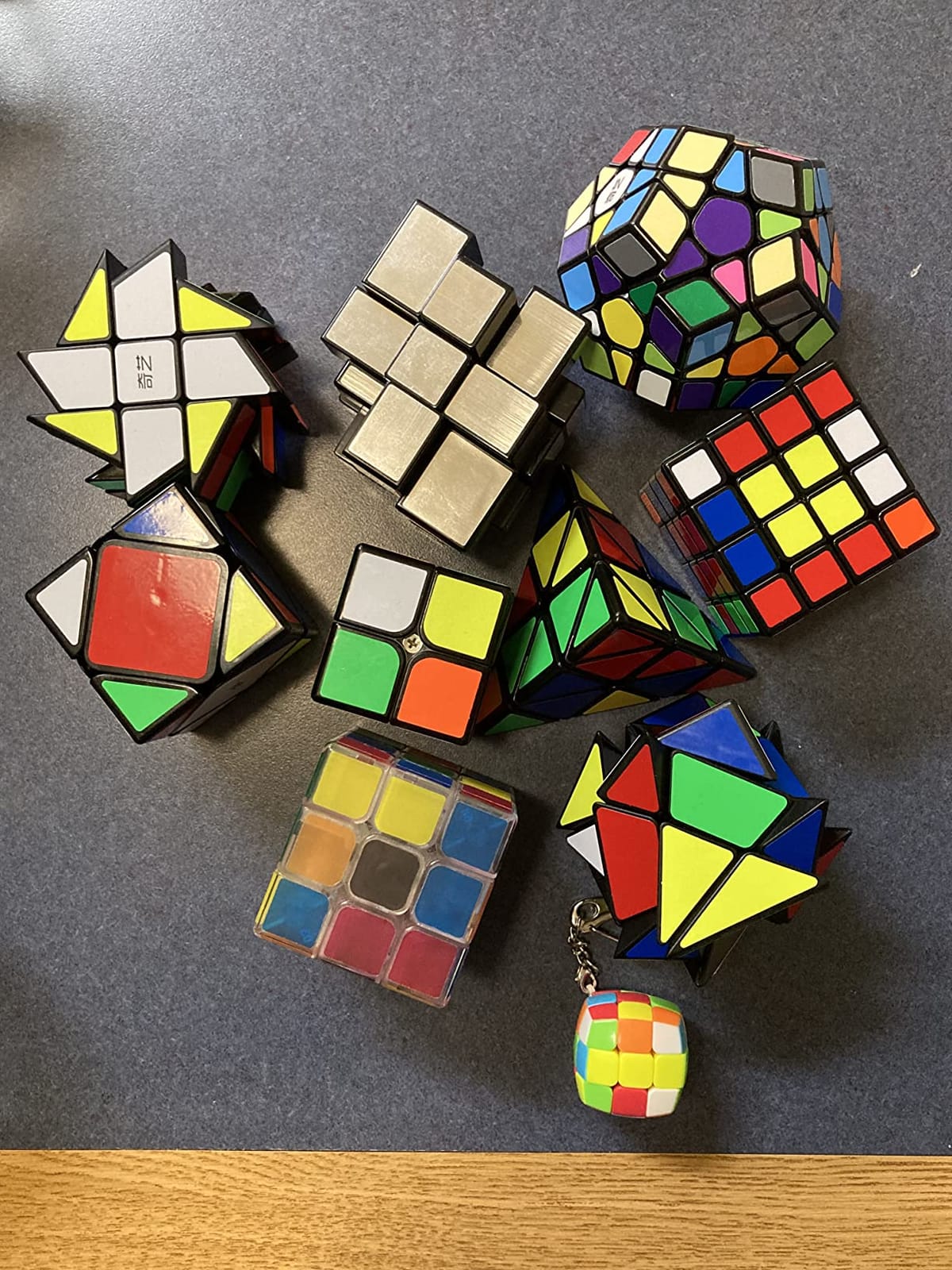 Speed Cube Set, Puzzle Cube,9 Pack Magic Cubes Pyraminx Pyramid + 2x2 + 3x3 + 4x4 + Megaminx + Mirror + Mini 3x3 + Skewb + Fenghuolun Puzzle Cube Toy for Kids & Adults customer photo 1