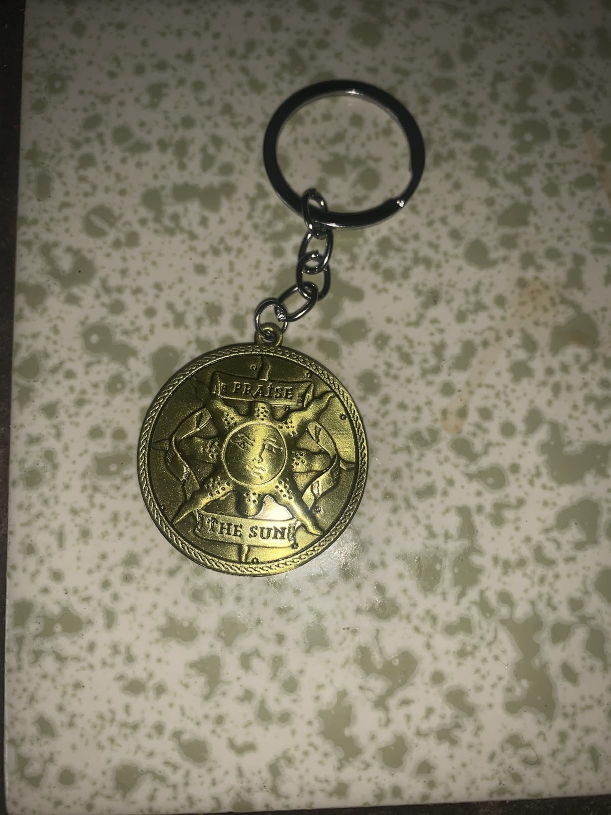 Souls LIke Inspired Praise The Sun Keychain customer photo 2