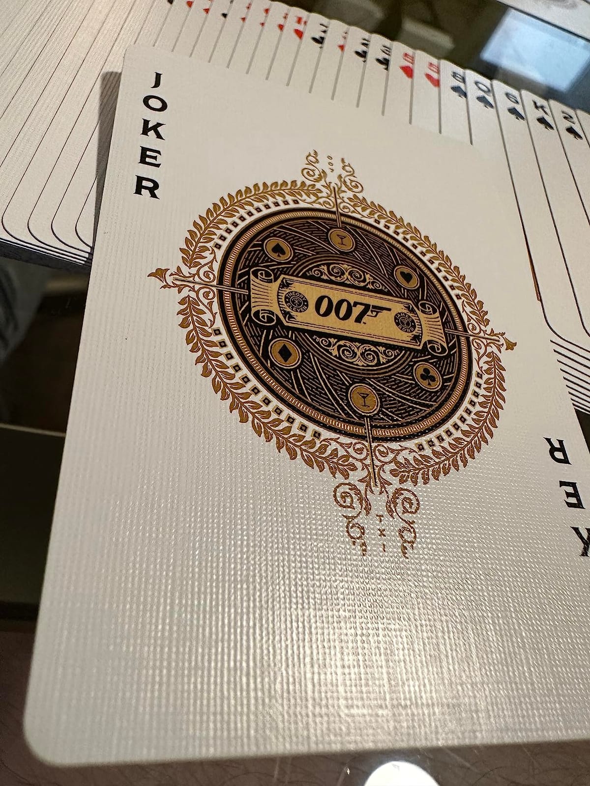 theory11 James Bond 007 Playing Cards – Gold Foil Spy Movie Poker Deck with Custom Aces, Jokers & Court Art for Magic, Cardistry, Game Night, Gifts, Bond Fans, Card Collectors, Magicians & Adults customer photo 2