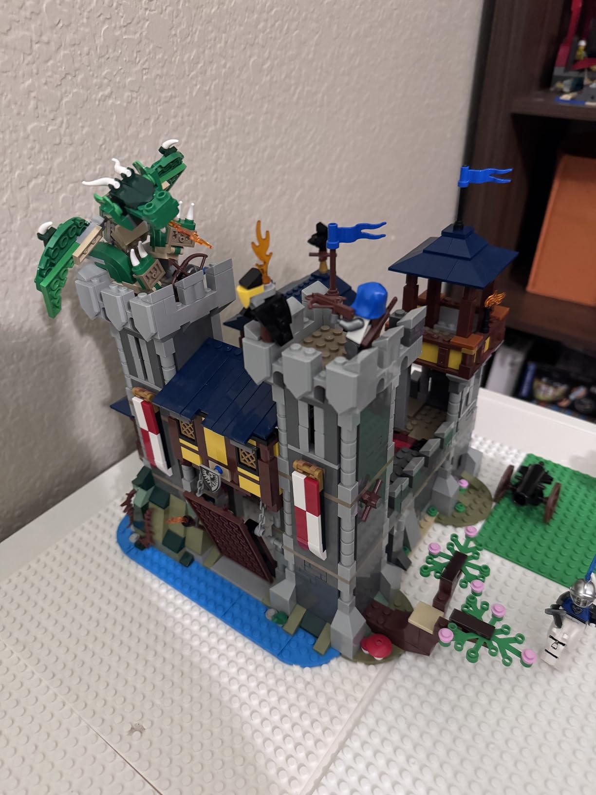 LEGO Creator 3 in 1 Medieval Castle Toy, Transforms from Castle to Tower to Marketplace, Includes Skeleton and Dragon Figure, with 3 Minifigures and Catapult, 31120 customer photo 2