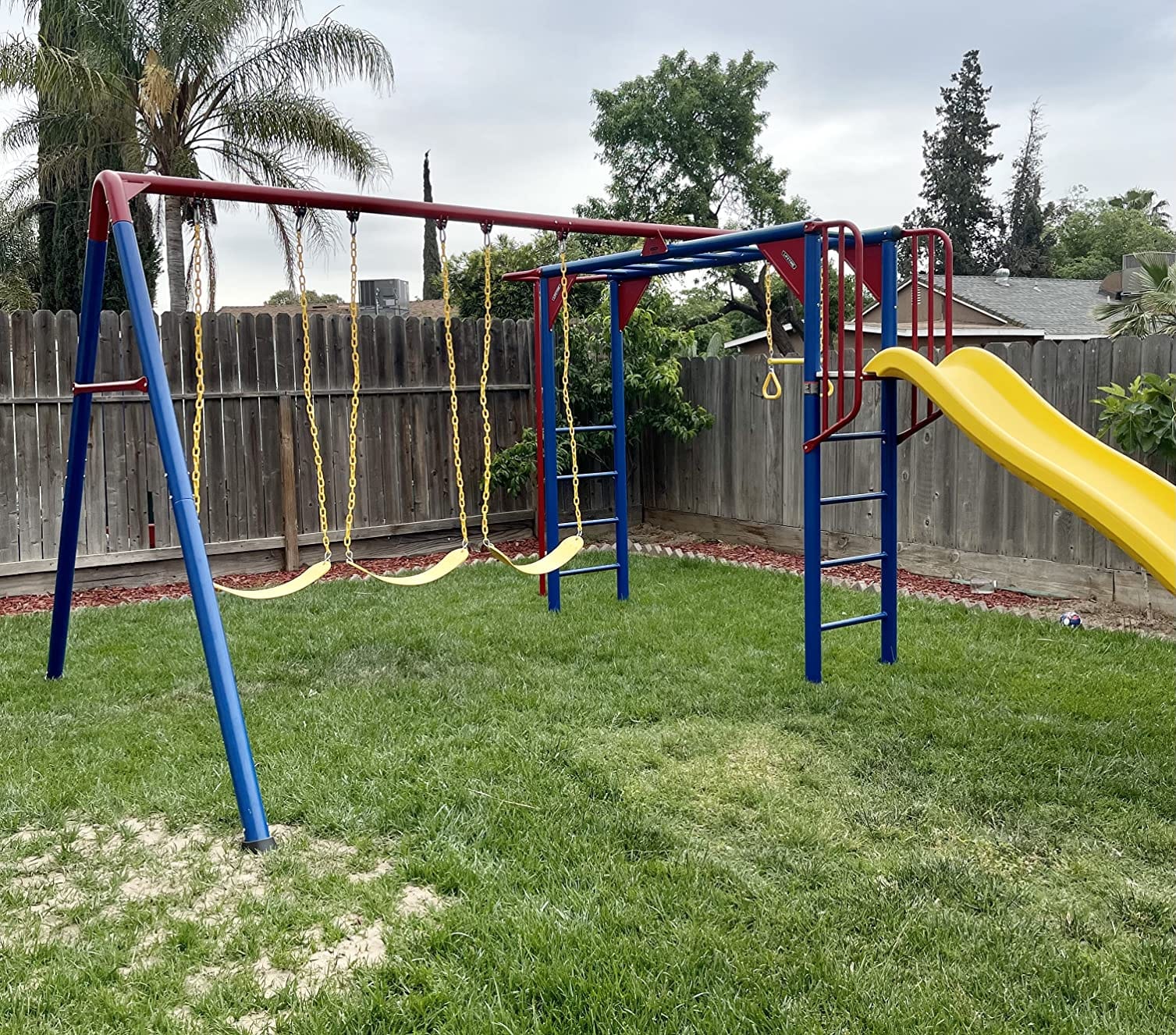 Lifetime 91028 Monkey Bar Adventure Swing Set with 3 Swings, Trapeze Bar, 9-Foot Slide and Fireman's Pole, Earthtone customer photo 1