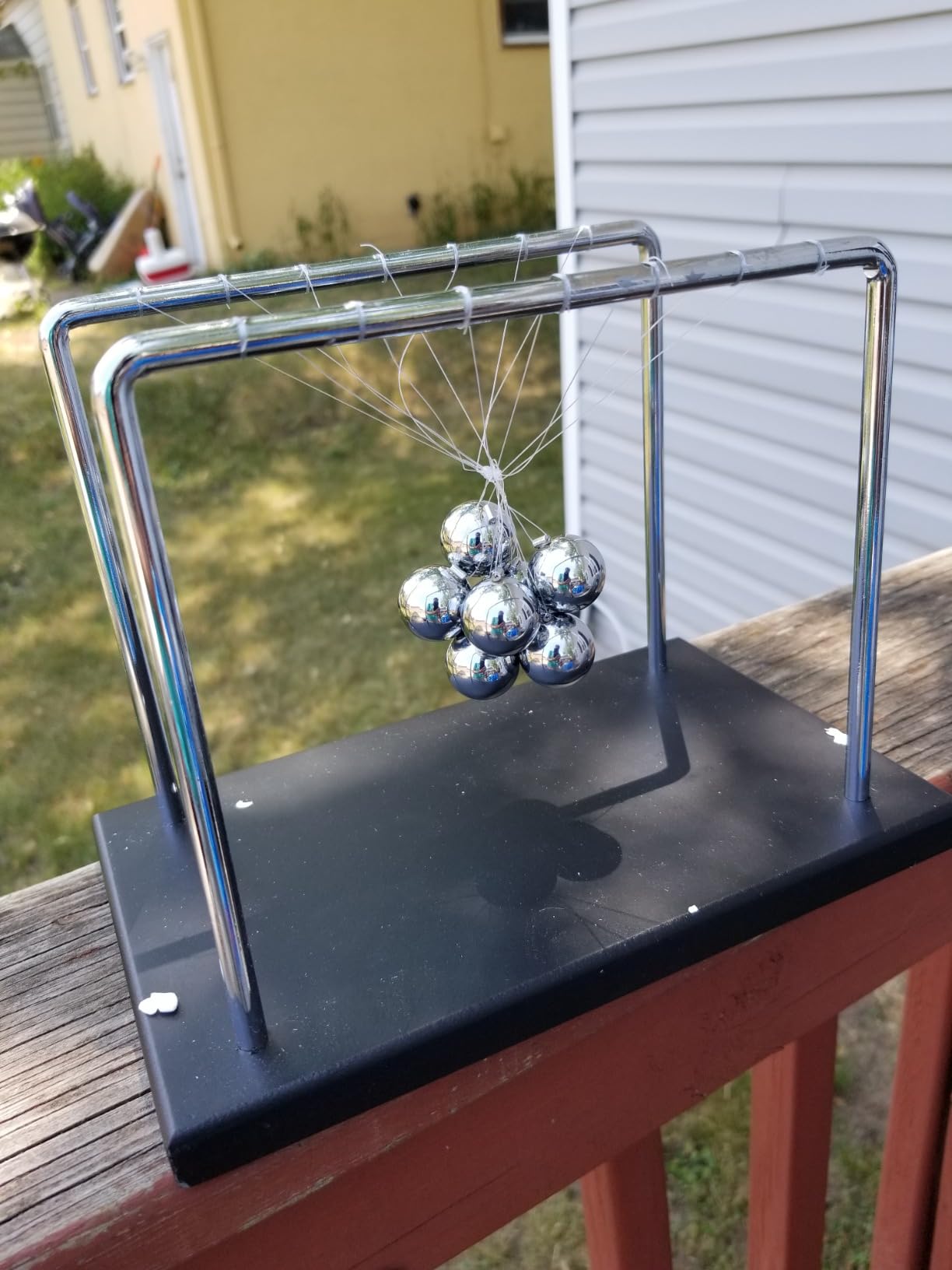 Newtons Cradle Balance Balls, Swinging Balls with Black Base, Science Physics Accessories for Adults, Calm Down Fidgets Kit, Desk Ornament for Stress Relief, Office Home Decoration (Black) customer photo 1