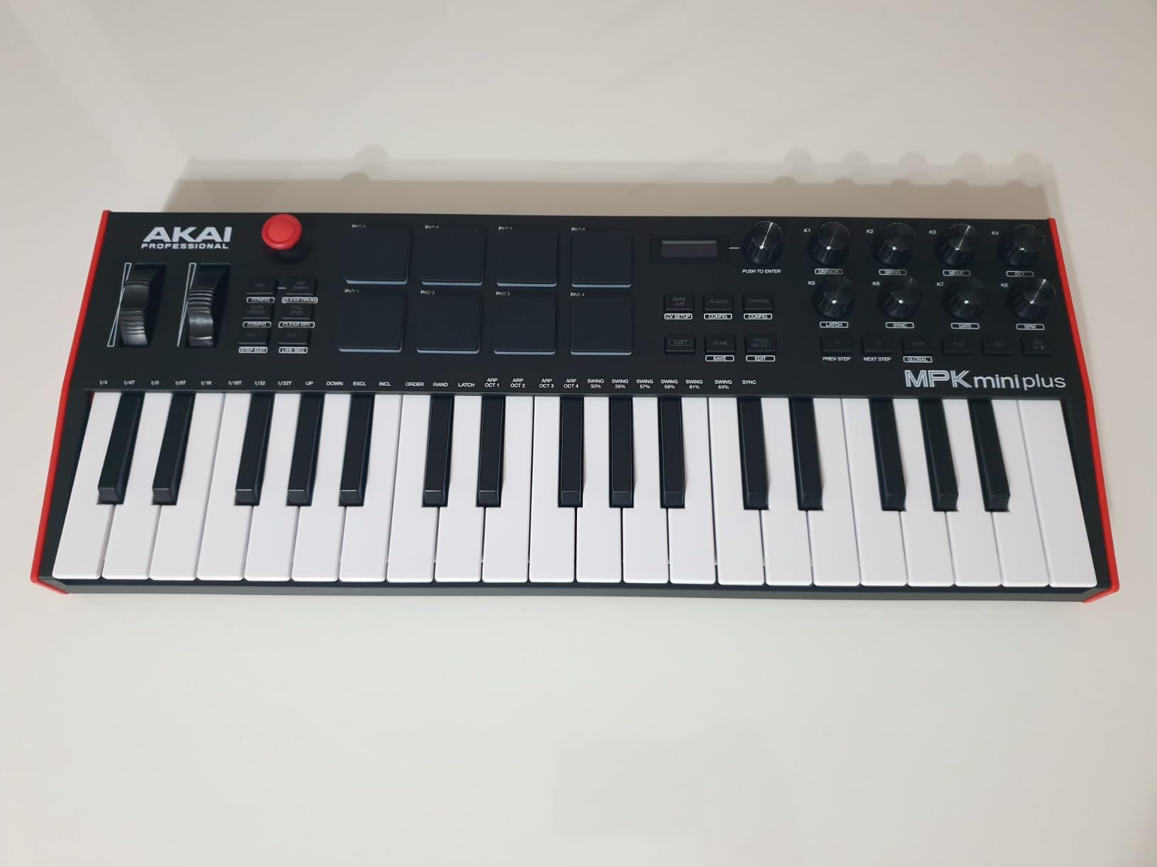 Akai Professional MPK Mini Plus 37-Key USB MIDI Keyboard Controller | Velocity-Sensitive Mini Keys, 8 MPC Pads, 64 Step Sequencer, MIDI/CV/Gate I/O, Software Suite Included, for Beat Makers customer photo 1