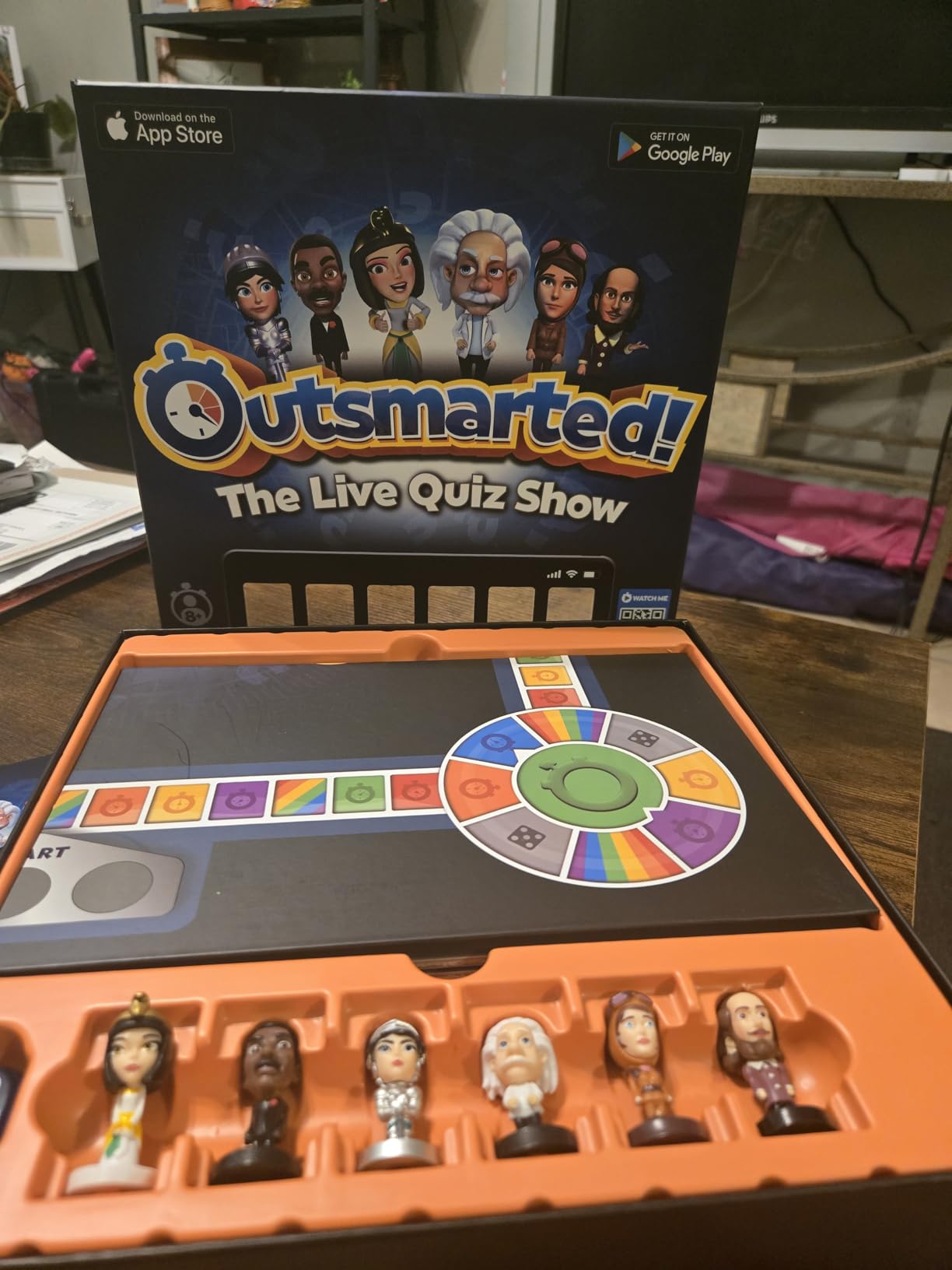 Outsmarted App-Connected Live Quiz Show Board Game - 2025 Edition, Ages 8+ | For Kids, Teens & Adults, Interactive Family Trivia Game, 2-24 Players, 10,000+ Questions, Remote Play Option customer photo 1