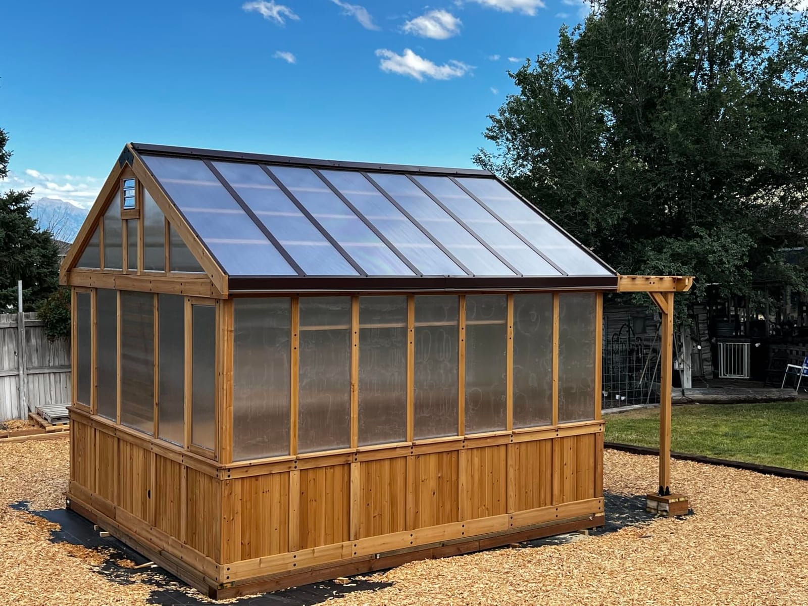 Backyard Discovery Bellerose XL 13' x 11' Cedar Wood and Polycarbonate Walk-in Greenhouse Kit with Pergola, Exhaust Fan, Windows, Hose Hook-Ups, PowerPort, Staging Shelves for Outdoor Gardening customer photo 1