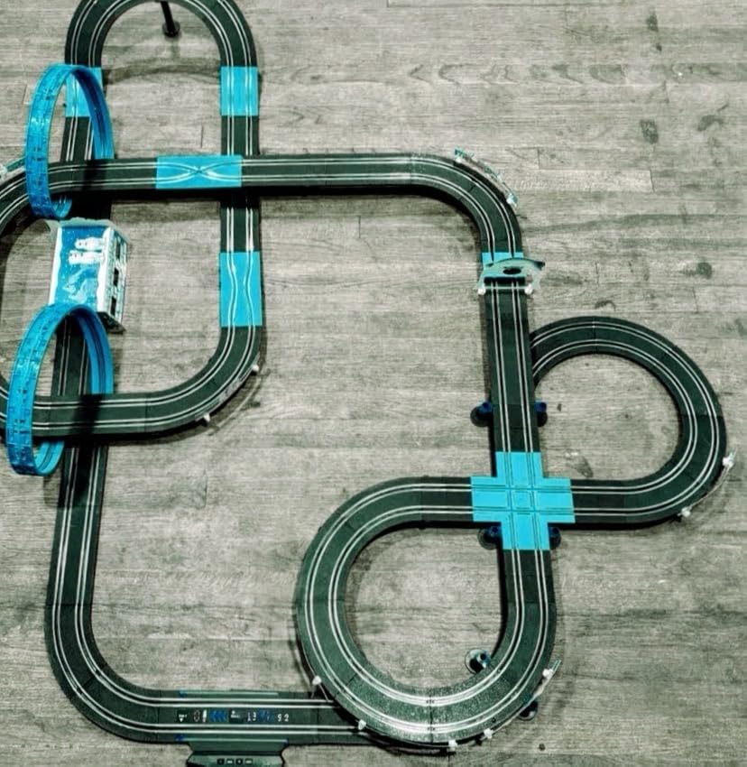 AGM MASETCH Slot Car Racing Set with LED Lap Counter, High Speed, Fuel Pit Stop, Voice Feedback, 4 Licensed Cars, 13.5m (44ft) Track, Electric or Battery Powered for Kids & Adults customer photo 2