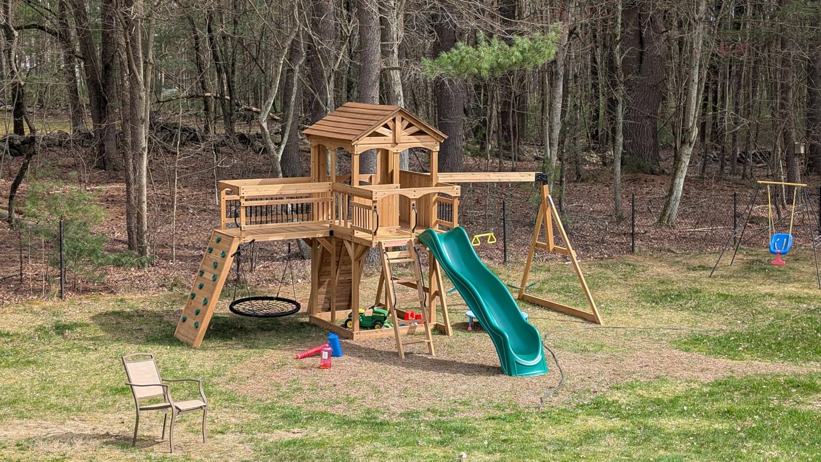 Backyard Discovery Dover Bay Spruce Wood Swing Set with Wave Slide, Clubhouse, Monkey Bars, Rock Wall, Belt Swings, Step Ladder, Toy Telescope, Chalkboard, Outdoor Playset customer photo 1
