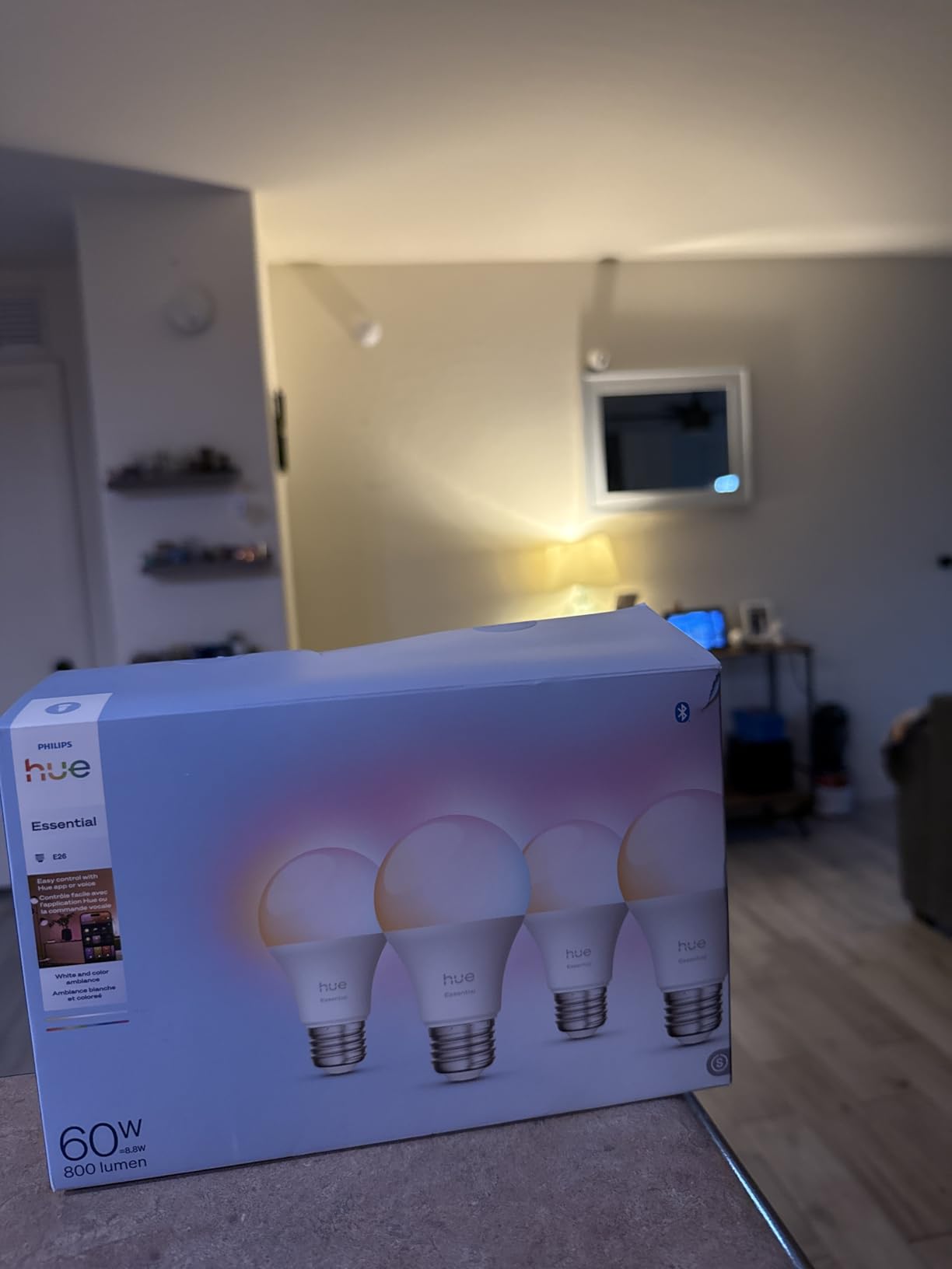 Philips Hue Essential Smart LED A19 Bulb, White and Color Ambiance, E26 Base, 8.8W, 2200K-6500K, 800 Lumens, Dimmable, Works with Alexa, Google, and Apple Home, 2-Pack customer photo 1